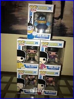 Funko Pop a complete set of the 4 Beatles plus their Mascot the Blue Meanie