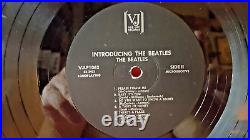 Introducing The Beatles extremely rare 1964 black label withsmall VJ brackets LP