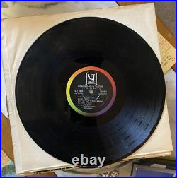 The Beatles-1964-Introducing. The Beatles-Vinyl Vee Jay-VJLP 1062 LP 33 RPM