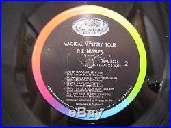 The Beatles Magical Mystery Tour Vinyl Record includes 24-page color book