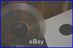 The Vintage Beatles RARE OFF CENTER LABEL Capitol LP 33 CLEAR WAX VINYL RECORD